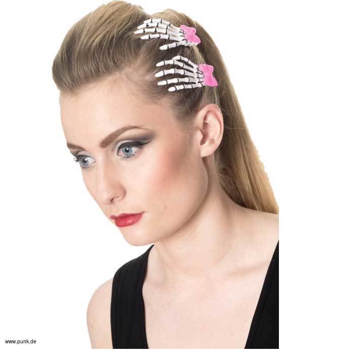 : Haarclip mit Skeletthand und rosa Schleifchen